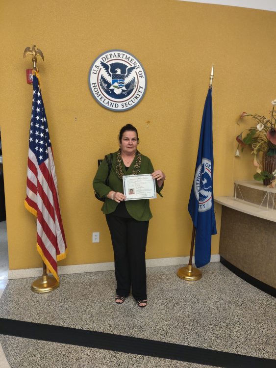 Dora receives her US citizenship.