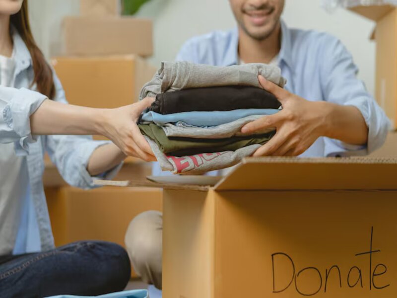 Aisle of a busy used clothing store | thrifted fashion for the whole family