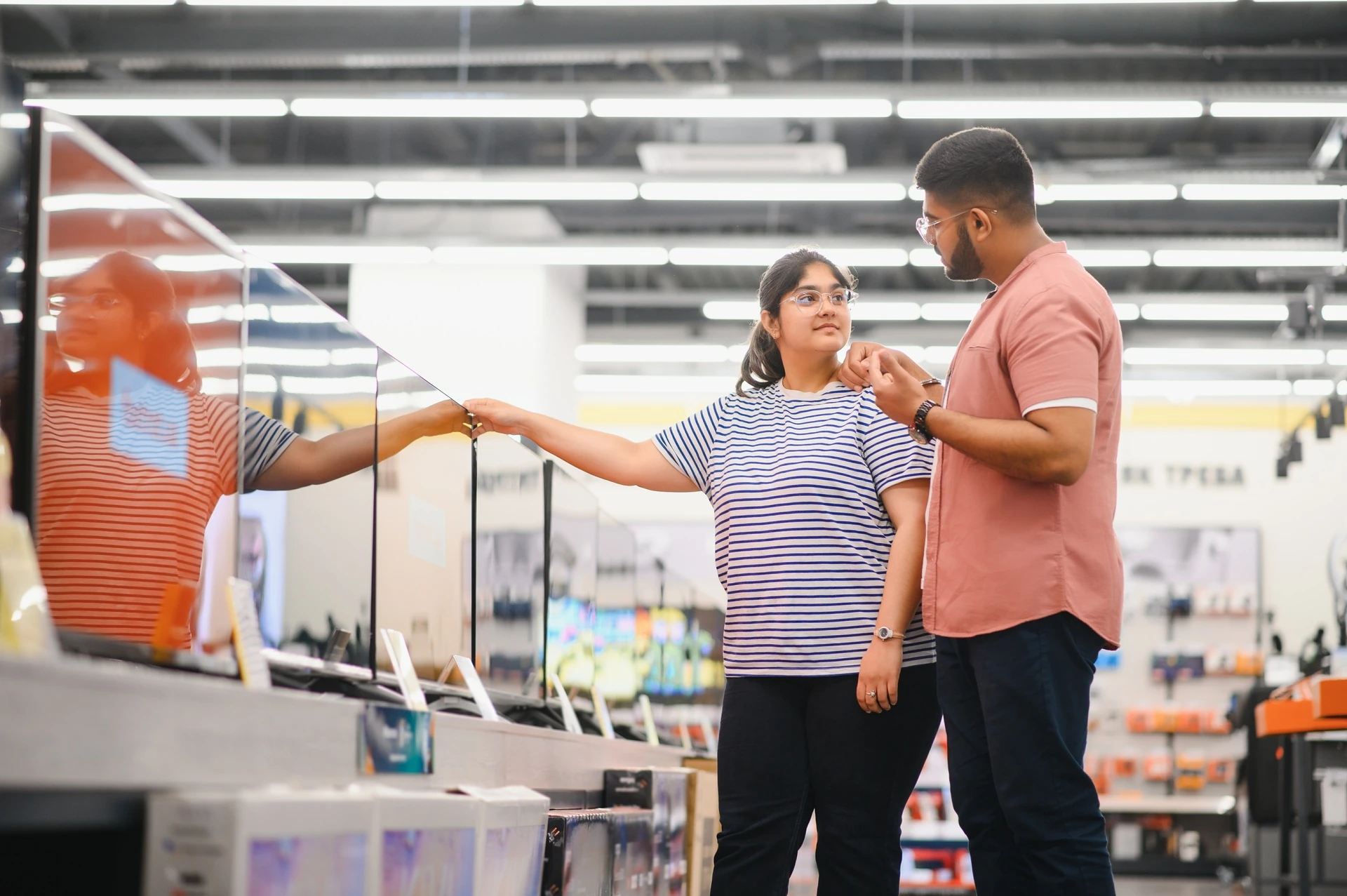 couple discussing over buying home appliances