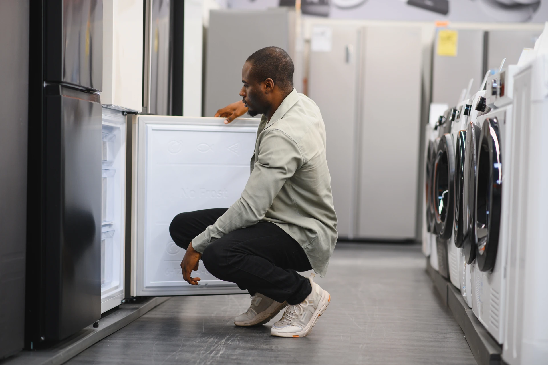 customer checking used appliances in goodwill palm beaches & treasure coast store