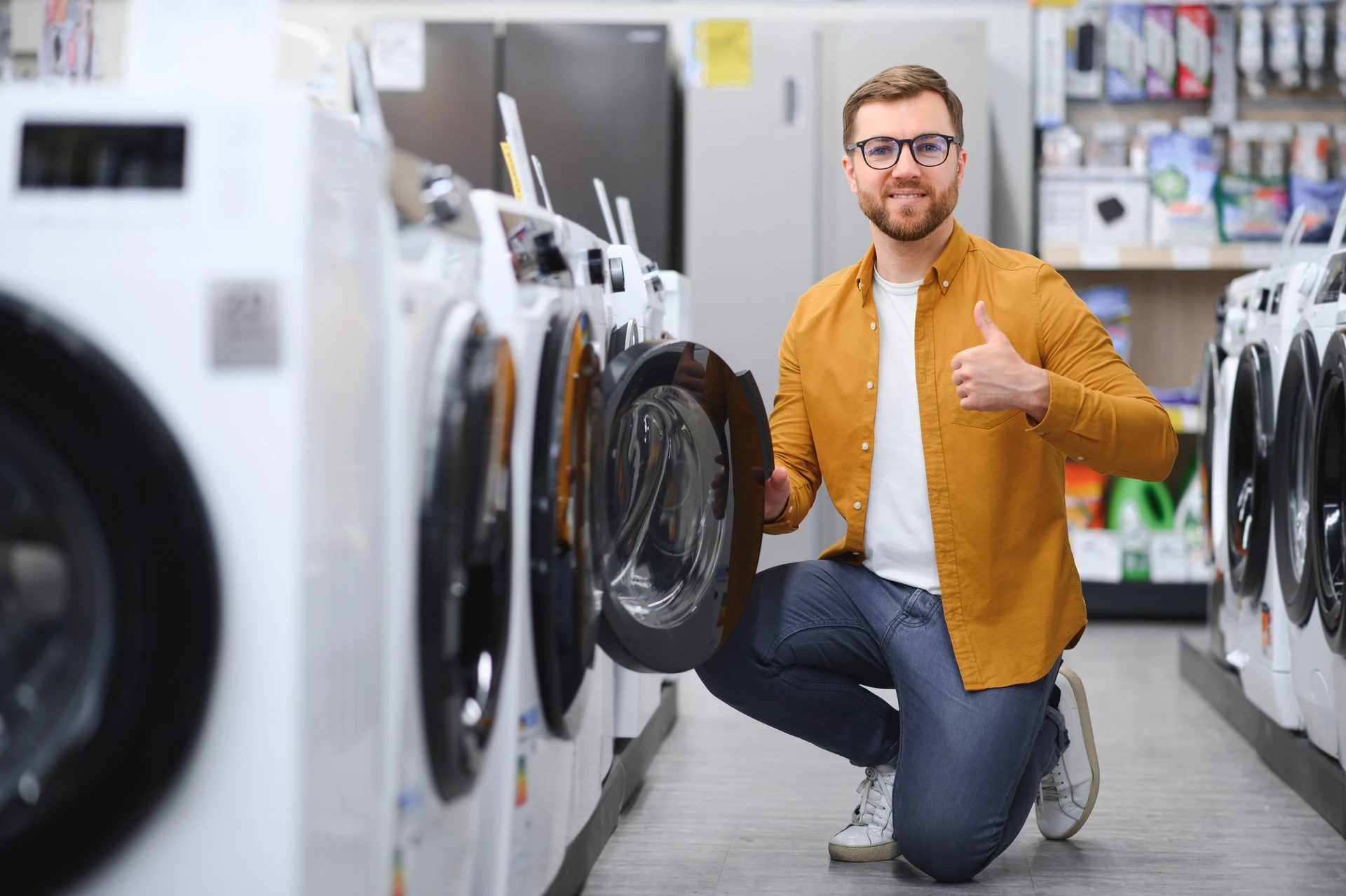 man chooses used appliances from goodwill manasota store