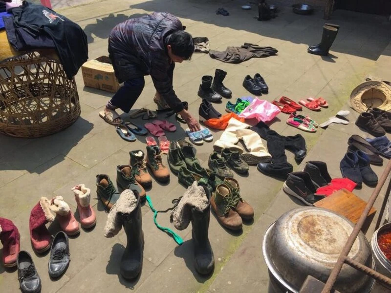 assorted pairs of goodwill shoes with different styles and sizes visible