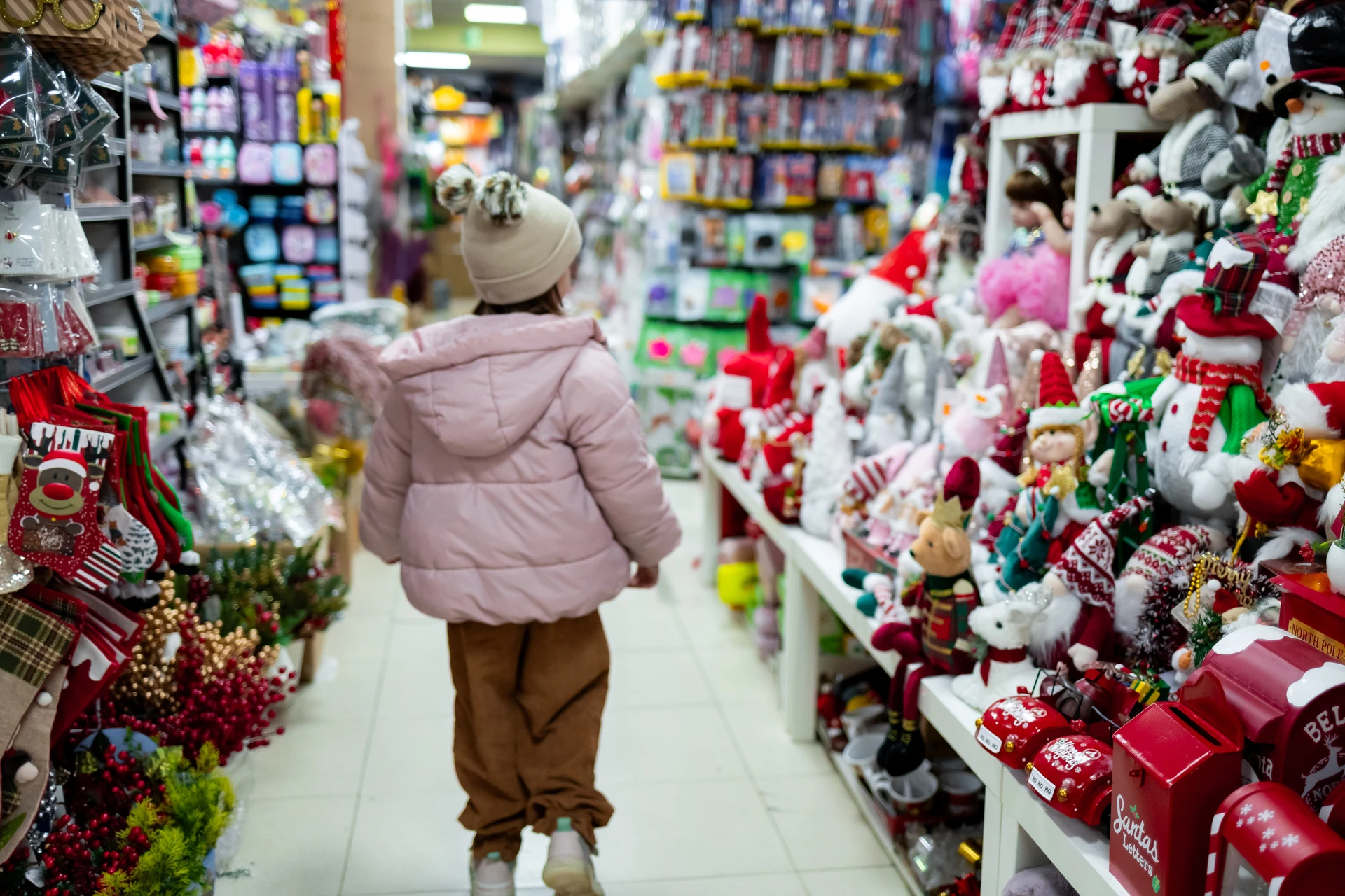 child browsing goodwill toys in west palm beach