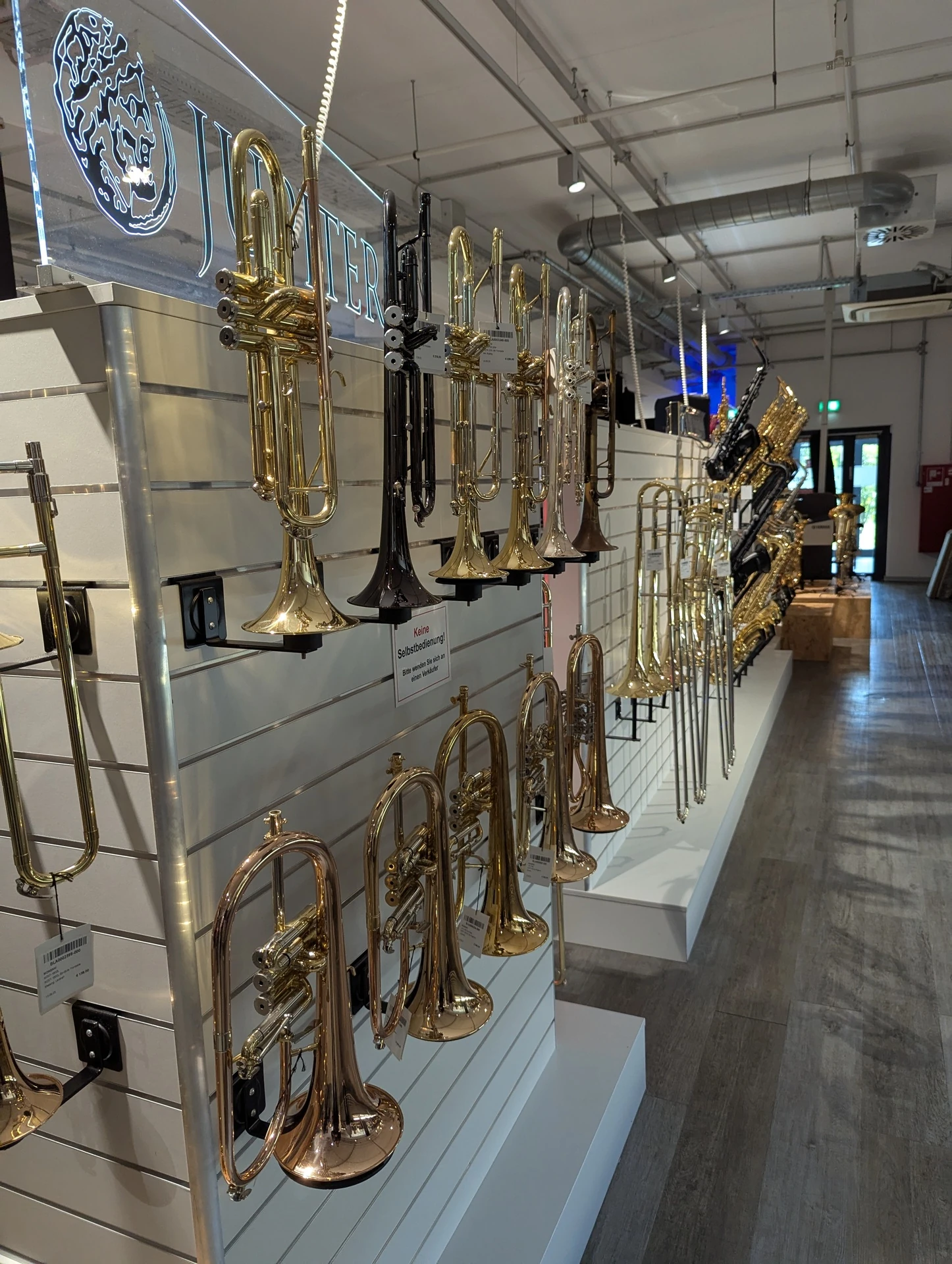 close up view of used trumpet in west palm beach with varied finishes and styles