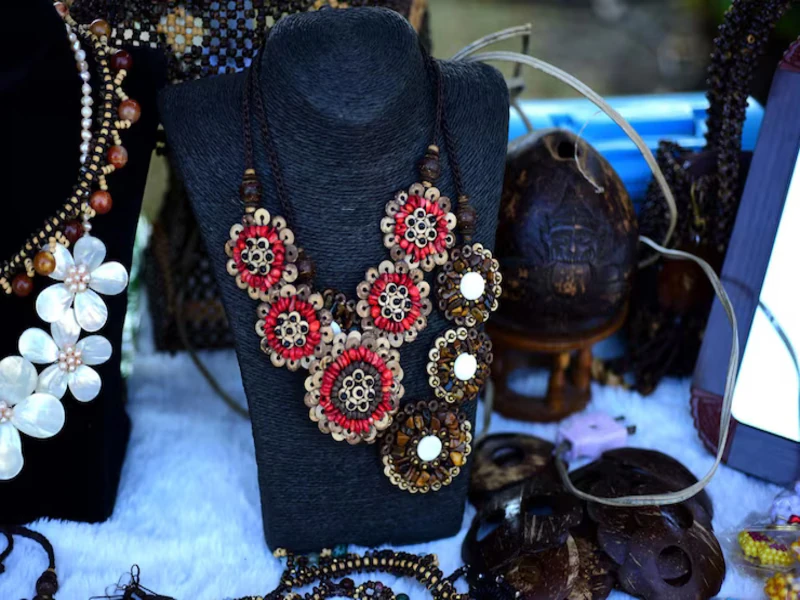 colorful fashion necklace set labeled as second hand jewelry in store display