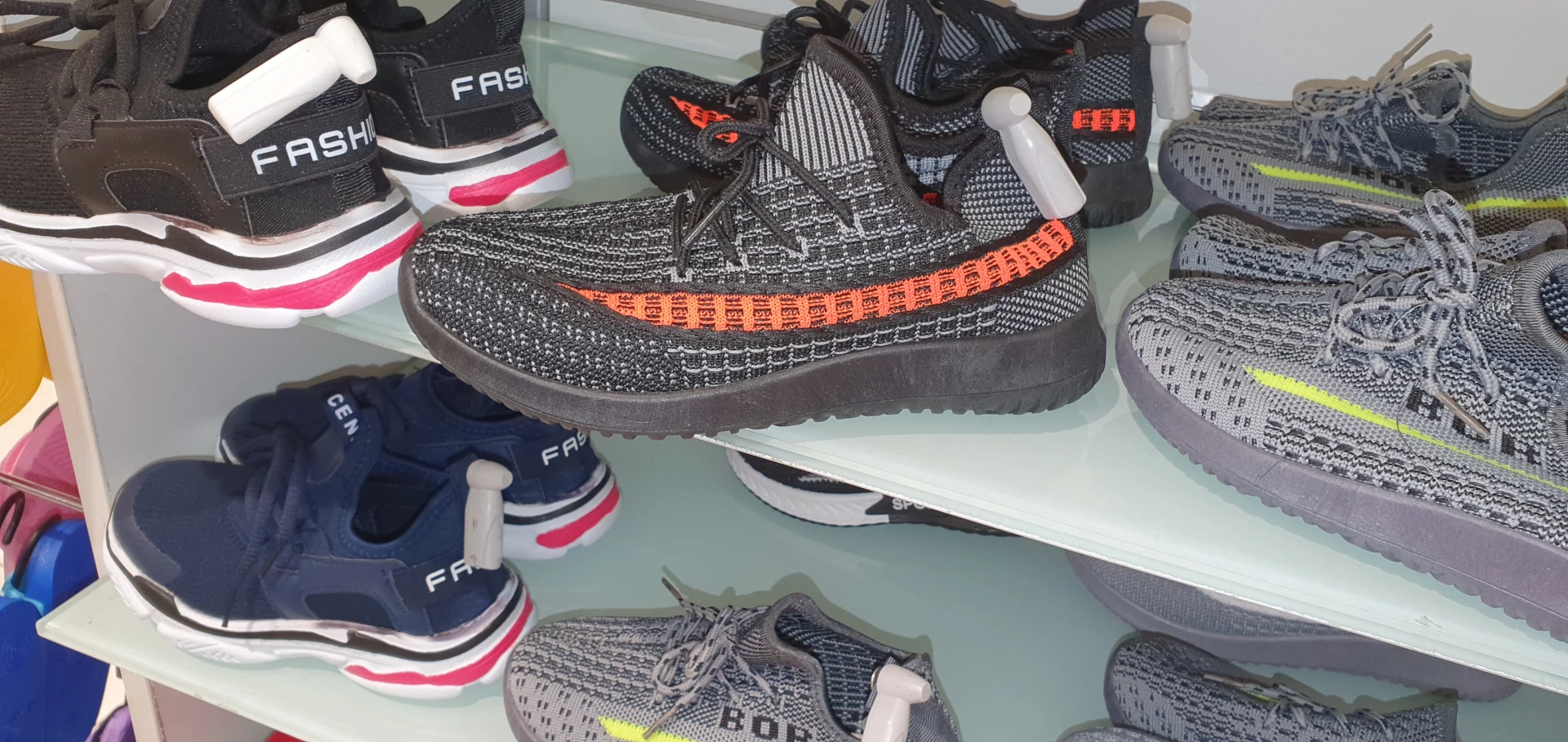 display of goodwill shoes in boynton beach at a local thrift store