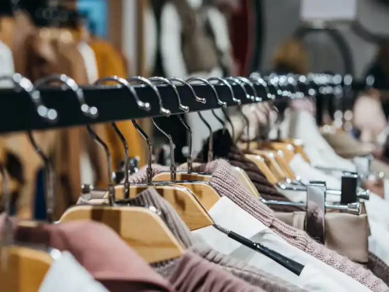 display of gently worn shirts at a goodwill clothing in boynton beach store