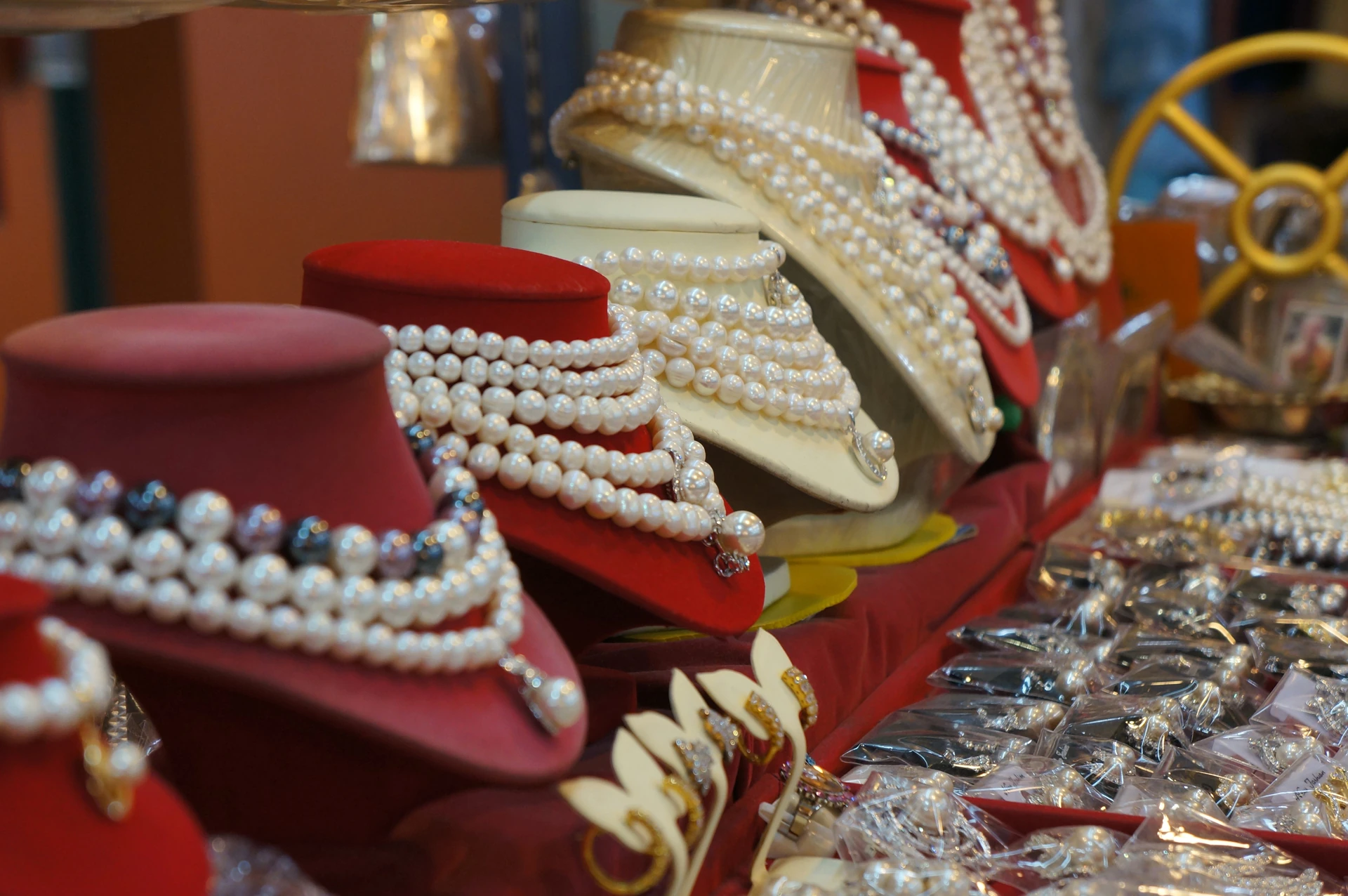 display of used pearl jewelry at goodwill jewelry in west palm beach