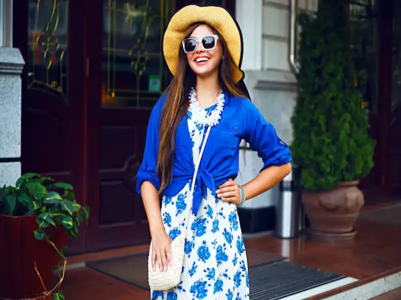 woman showing a mix of casual and vintage pieces available at a used clothing store