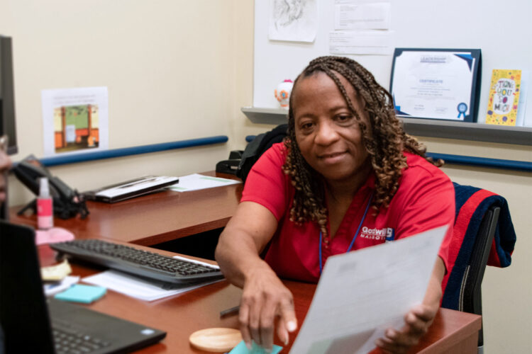 Goodwill career coach with client A Goodwill career coach meets with a client